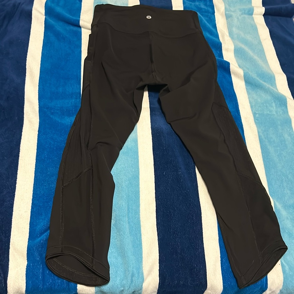 Black lululemon leggings, mesh on the sides